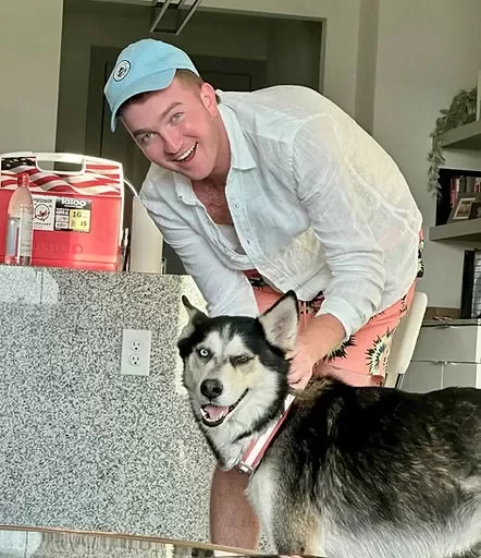 Licensed Agent of the Freedom Financial - "Blake Heckler" with his dog