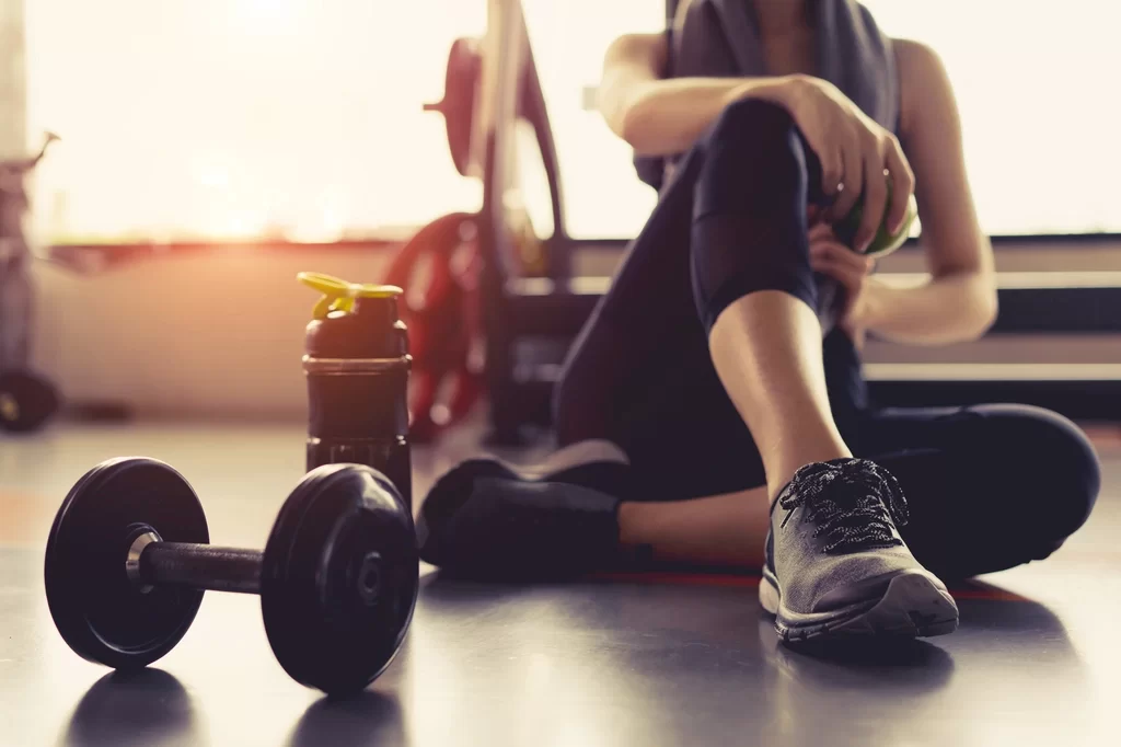 Girl sitting after workout