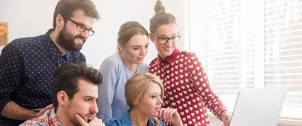 Team Seeing laptop