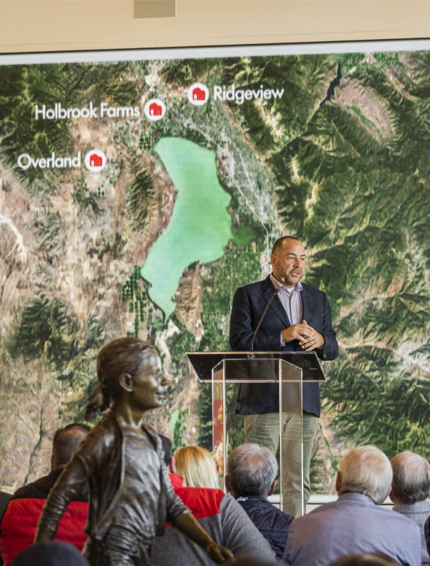 Men is speaking on the stage