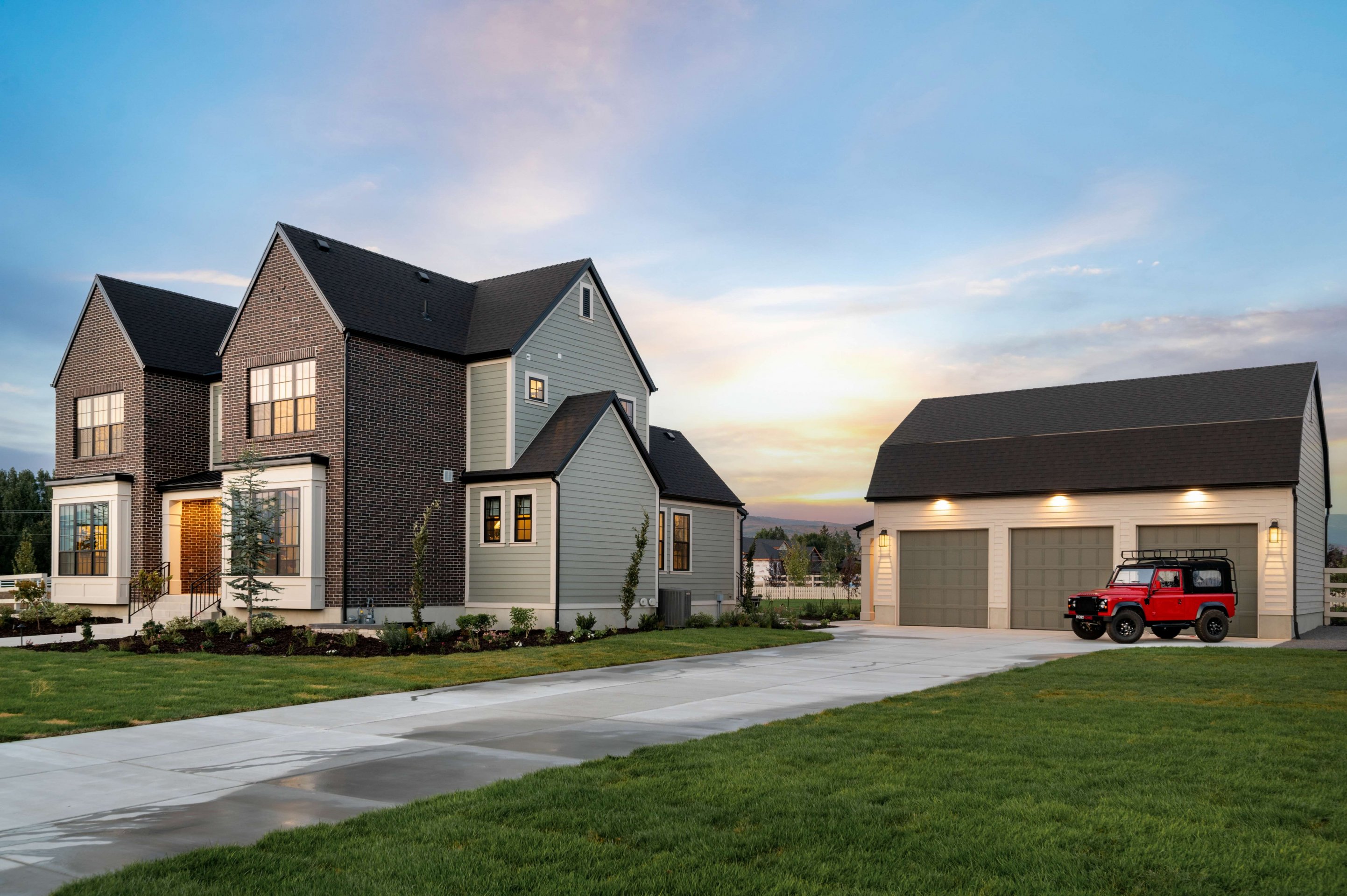 Garfield Traditional model home with detached three-car garage at Christensen Farms